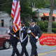 Bedford Hills firefighters march in the Mount Kisco Fire Department's annual parade.