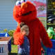 Elmo greets his fans at the Great Pumpkin Festival at Boothe Memorial Park.