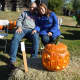 This couple show off their carved creation at the Great Pumpkin Festival at Boothe Memorial Park.