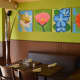 Basso Café Restaurant and Bar in Norwalk has bright walls adorned with large canvas paintings. The dining room seats 60 diners. 