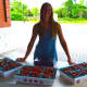 Jessica Smalley sells fresh strawberries from Jones Family Farms at the Shelton Farmers Market.