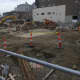 The lot is torn up as work continues on expansion of Lafayette Hall at Housatonic Community College in Bridgeport.