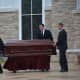 Pallbearers move Frances Ghelarducci casket to a hearse following her funeral at St. Joseph's Church in Somers.