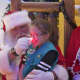 Santa and Mrs. Claus are on hand to greet children.
