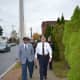 Harold Dimbo, left, of Project Longevity and Bridgeport Police Chief A.J. Perez join police officers in a walk around the city's East End.