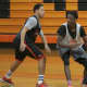 The Spring Valley High boys basketball team preps for the winter season in a scrimmage vs. White Plains. 