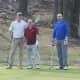 Area residents hit the links at Norwalk's Oak Hill Golf Course to enjoy the spring weather.