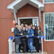 Cutting the ribbon on the 1,900-square-foot home on Bergen Avenue.