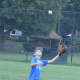 Catching a fly ball.