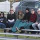 Fans take in the action on a chilly spring day.