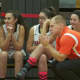 Pawling coach John Sullivan and the Tigers bench watch the action.