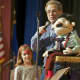 A ventriloquist entertains at Saugatuck Elementary School.