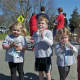 A group of children hydrate after a tough race Sunday morning at Greenwich Point Park.