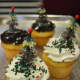Christmas tree-topped cupcakes are one of many holiday treats at Reinhold's.