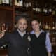 Aroma Osteria Owner Alex Kovacs with Catherine Lugones.