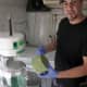 Michael Fertucci turns frozen green tea into a shaved ice treat.
