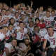 Somers players celebrate after beating Burnt Hills in the New York State Class A semifinal Friday night at Dietz Stadium.