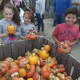 Visitors pack Outhouse Orchards on fall weekends for apples, pumpkins, baked goods, and more.
