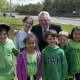 Mayor Harry Rilling poses with poster contest winners from Marvin Elementary School.