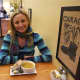 General Manager Melissa Beck with a cup of Thai Red Lentil soup with sourdough miche.