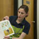 An EverWonder staff member reads to children during 'Story Lab."