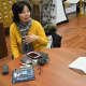 Wei Nitopi, left, explains a point about the Chinese language for Kay Rhee.
