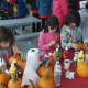 Kids carve and decorate pumpkins before Sunday's race.