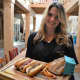 Megan Low-Nobile with an array of hot dogs and homemade fries.