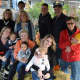 The Low family in the pumpkin patch at Fresh and Fancy Farms in New Milford.