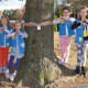 A Wyckoff Daisy troop tied rainbow ribbons around trees throughout town to support those affected by cancer.