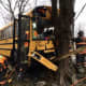 Westport firefighters work to free a school bus driver trapped following a crash.
