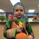Peter Iodaci, 5, finds a hidden pumpkin. 