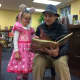 Daniel Kurcz reads a story to Zoe, 3.