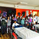 Heavenly Productions Foundation volunteers with students at Atmosphere Academy.