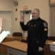 Sergeant Sisenstein is sworn in by Town Clerk Lori Kabeck