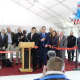 Gov. Dannel Malloy cuts the ribbon for the official opening of the Rinks at Veterans Park in Norwalk.