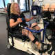 Lois Hamilton cools down from her workout on a specialized bike at Push to Walk in Oakland.