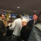 Lt. Gov. Nancy Wyman winds through the crowd at Bradley International Airport on Sunday after speaking in support of the protest.
