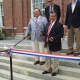 Third Building Committee Chairman Michael T. Averginos and First Selectman Robert E. Mallozzi cut the ribbon on the renovated Town Hall in New Canaan on Saturday. 