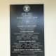 A plaque honoring the third building committee is featured in the new town hall.
