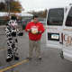 Distributing turkeys at Stew Leonard's for those in need with Wow the Cow.