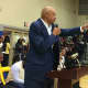 Curtis March addresses the crowd at a court-naming ceremony in his honor Thursday, Jan. 7 at Teaneck High School.