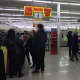 Shoppers browse the liquidation sales at Kmart in Lodi.
