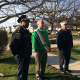 Stratford Police Chief Patrick Ridenhour, Irish Mayor for a Day James Connor and Fire Chief Robert McGrath raised the Irish flag at the town's annual St. Patrick's Day celebration.