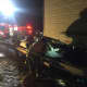 Fairfield Firefighters work at the scene of the multi-vehicle crash on I-95 early Tuesday.