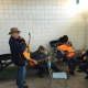 Musicians hold a jam session at the Shelton Farmers Market Saturday.