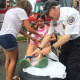 Sandy Onorato and a Paramus EMT strap Chelsea, 17, onto a stretcher. Don't worry, it was just for the photo-op.