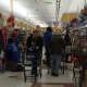Lines awaited those waiting for the last minute to buy up staples at a local Stop & Shop.