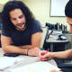 Will Esposito helps Michael Serrano, a New Milford High School junior, take a personality test at HYPELITE.