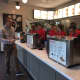 Employees take part in a bit of last-minute training before the grand opening Thursday for Chick-Fil-A.